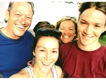 Lisa Wilson smiling with her family